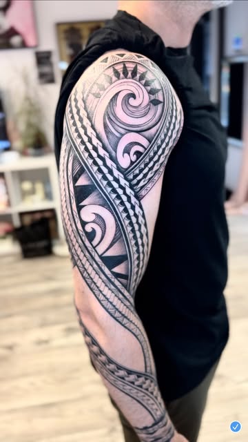 Black Polynesian pattern sleeve over the shoulder and arm