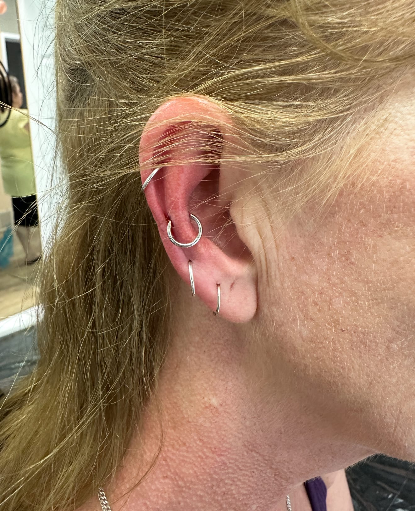 Curated ear with helix hoops and lobe piercings